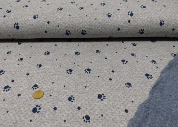 Knitted fabric Milo grey blue with paws paw fabric cotton